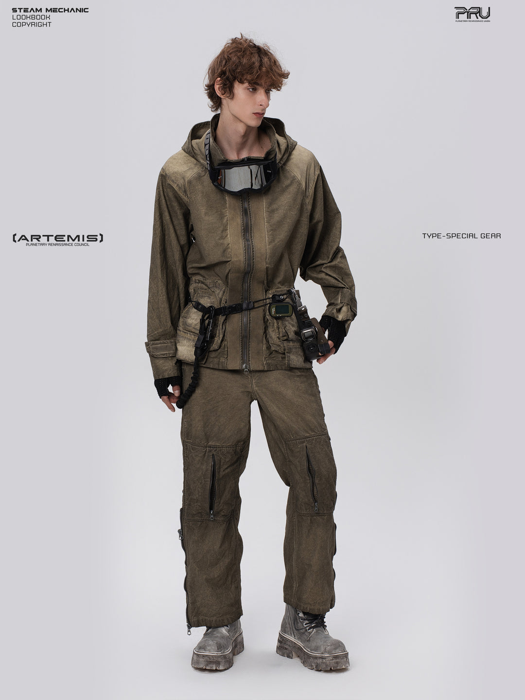 STARCORE distressed work jacket in lunar soil green — full-length front modeled view with one hand on hip