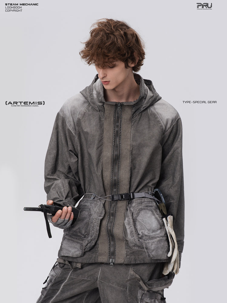 STARCORE meteor gray distressed work jacket — front modeled close-up with handheld radio