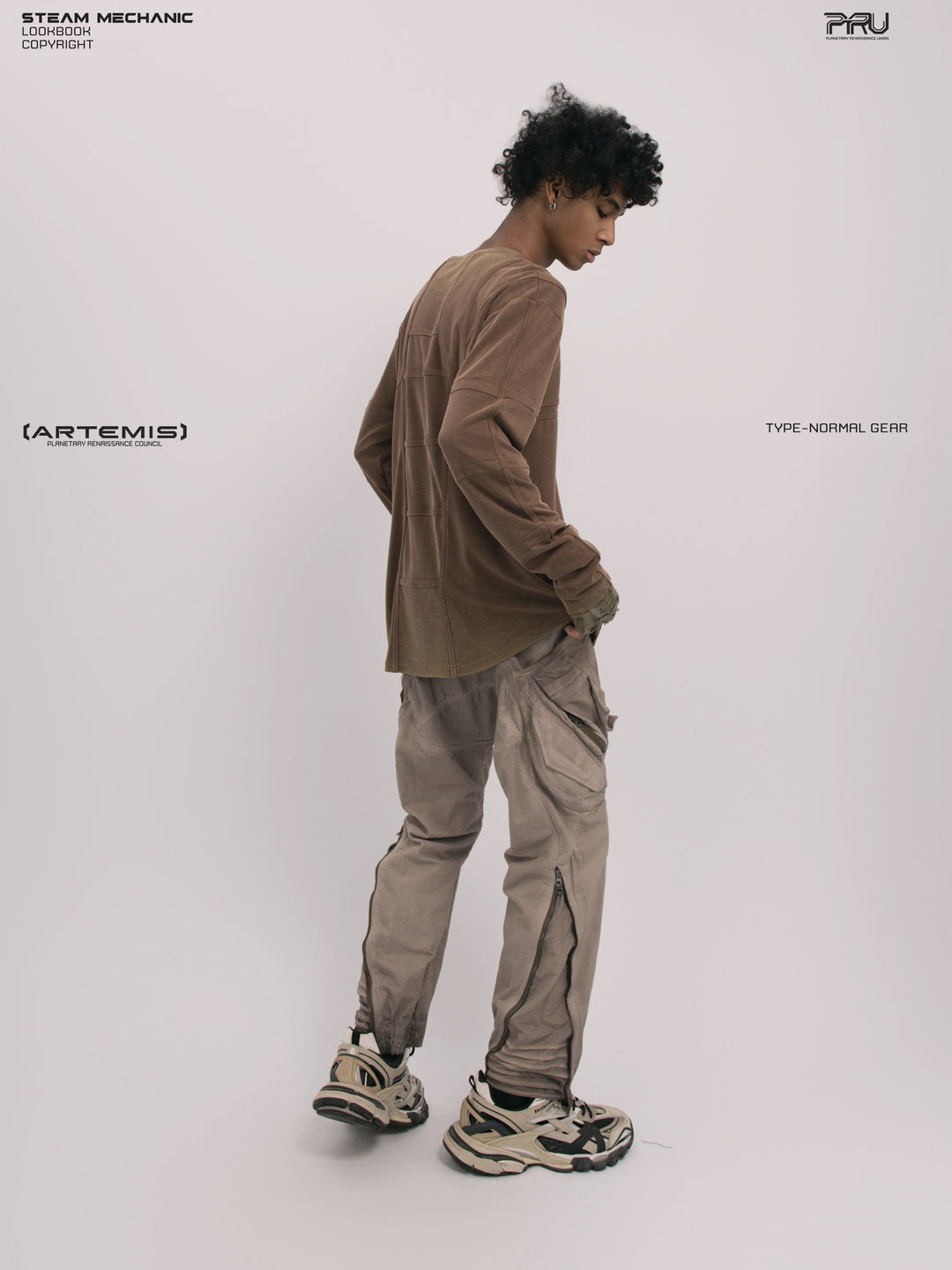 RUSTED ORBIT petrified brown mesh-panel long-sleeve top — full-length side modeled view