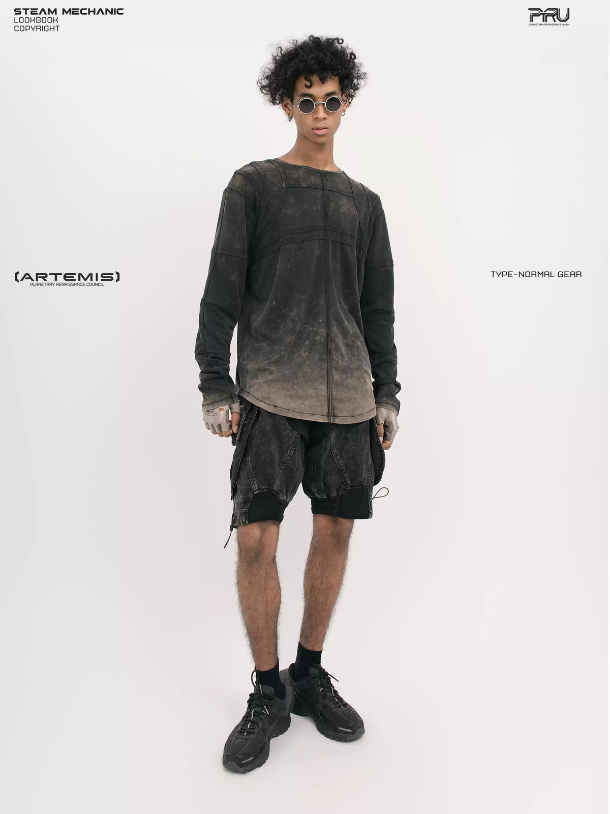 RUSTED ORBIT mesh-panel long-sleeve top in phantom black — full-length modeled front view