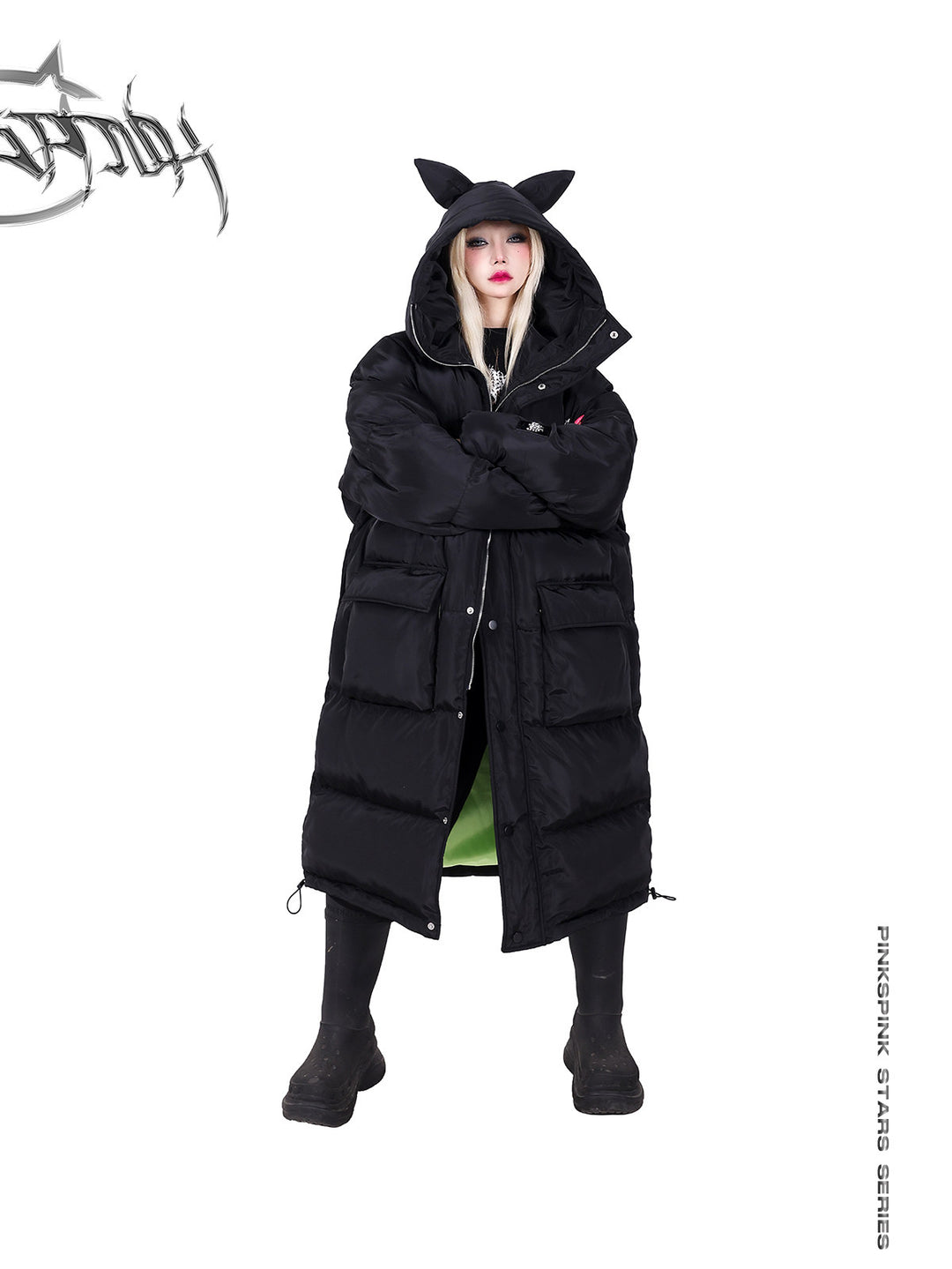 PINKSPINK CAT ALIEN long cat-ear padded coat — front modeled view with the cat-ear hood up and arms crossed