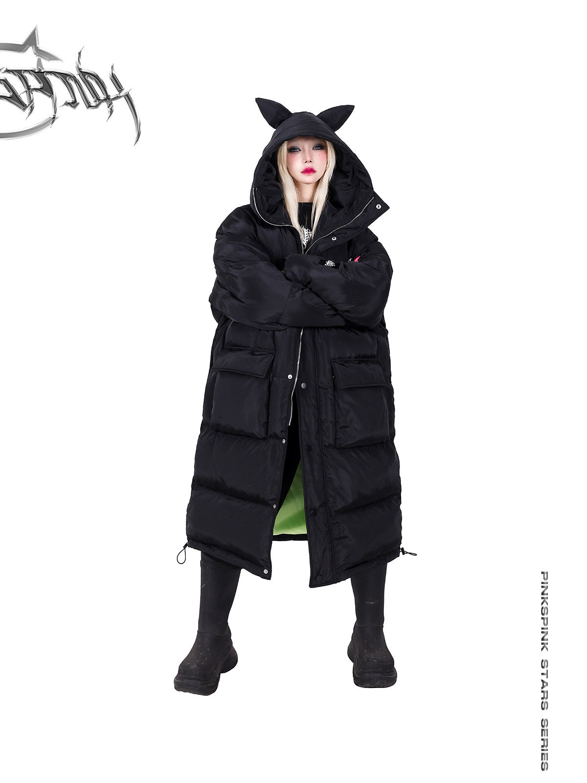 PINKSPINK CAT ALIEN long cat-ear padded coat — front modeled view with the cat-ear hood up and arms crossed