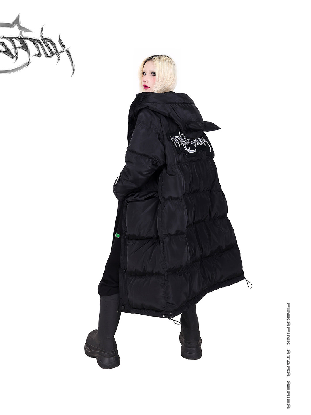 PINKSPINK CAT ALIEN long cat-ear padded coat — rear three-quarter modeled view looking back with hood down