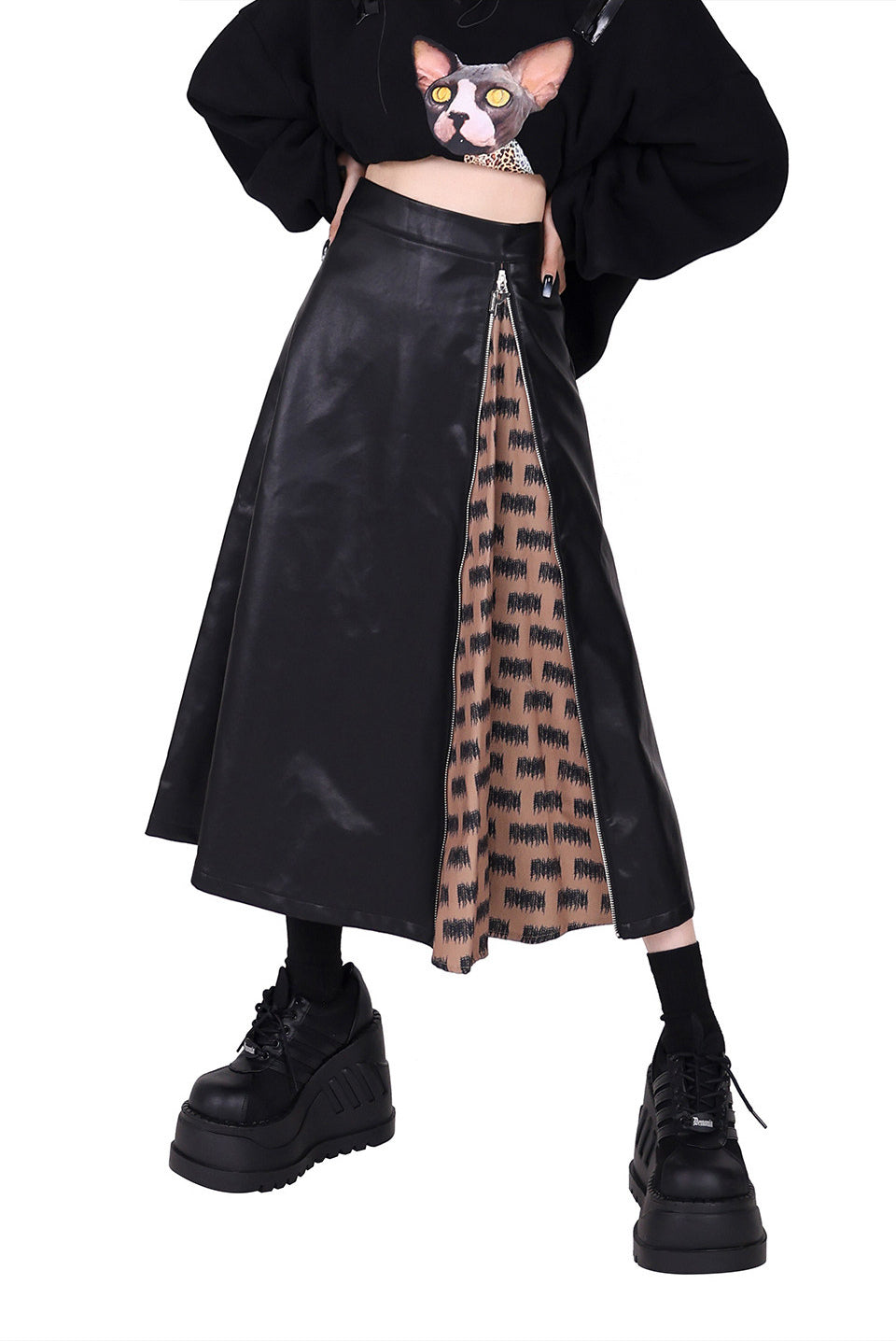 PINKSPINK EXHIBITION CORE zip A-line midi skirt — full-length modeled styling view