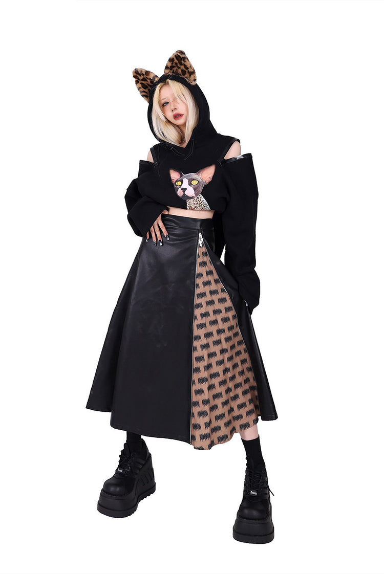 PINKSPINK EXHIBITION CORE zip A-line midi skirt — product detail view showing texture and hardware