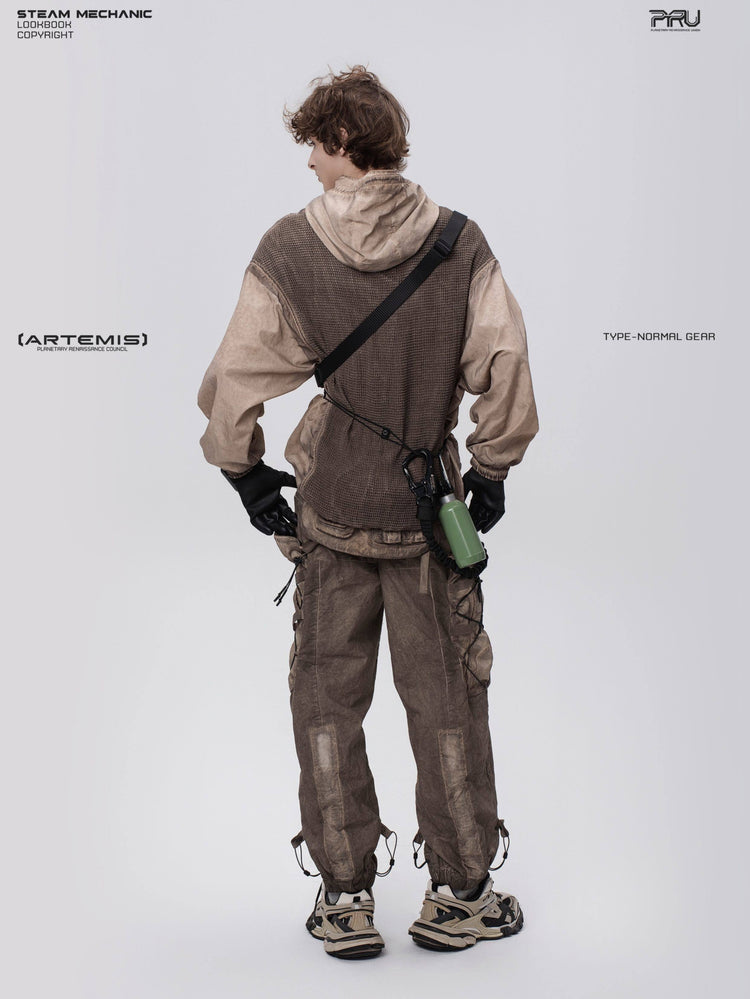 PIONEER detachable-hood mesh hoodie in mercury brown — full-length rear three-quarter modeled view with hands at the waist