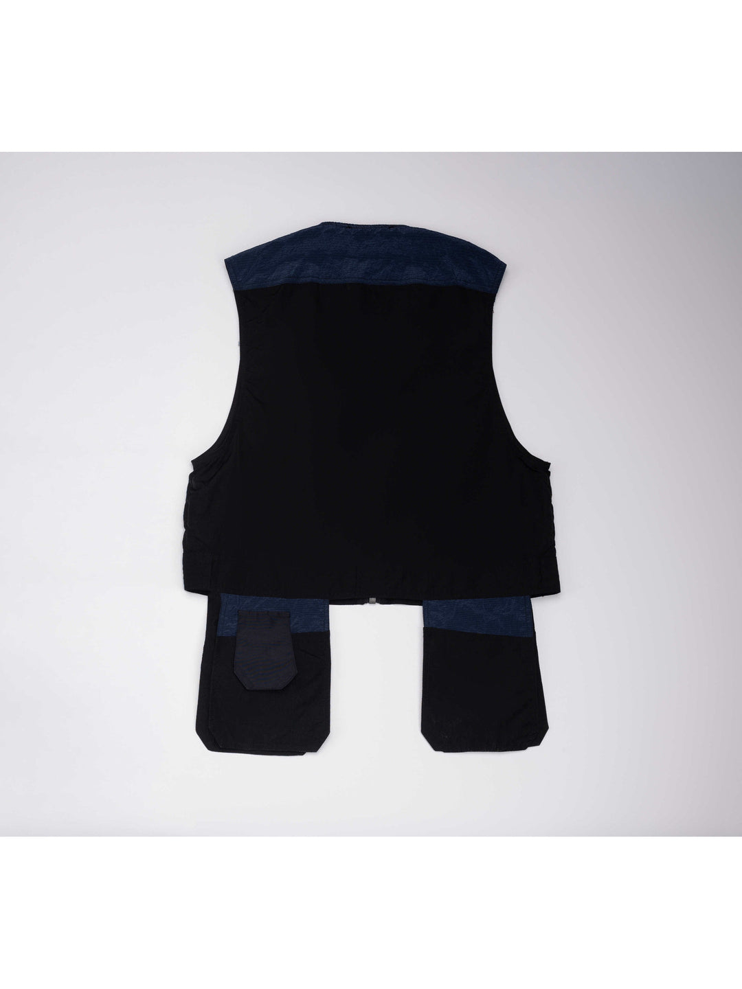 PIONEER stardust black multi-pocket technical vest — back flat-lay showing the blue shoulder panel and extended rear pockets