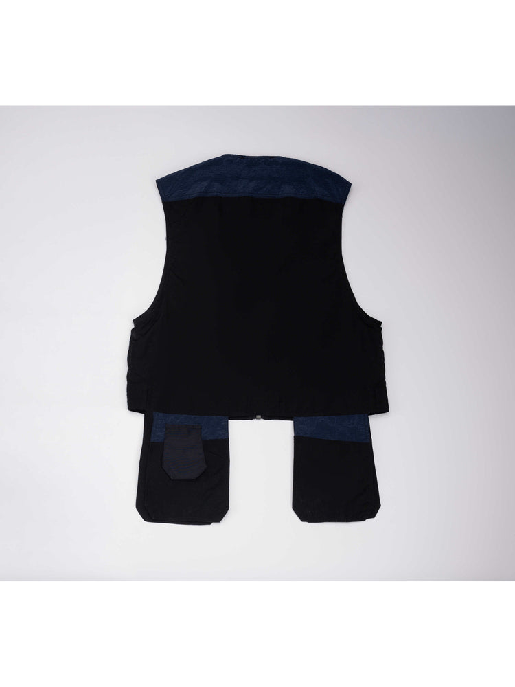 PIONEER stardust black multi-pocket technical vest — back flat-lay showing the blue shoulder panel and extended rear pockets