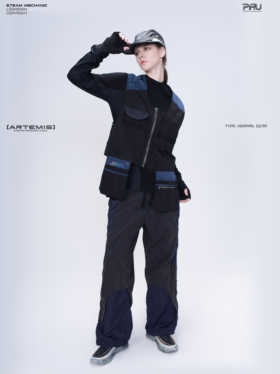 PIONEER stardust black multi-pocket technical vest — full-length modeled front view with raised hand