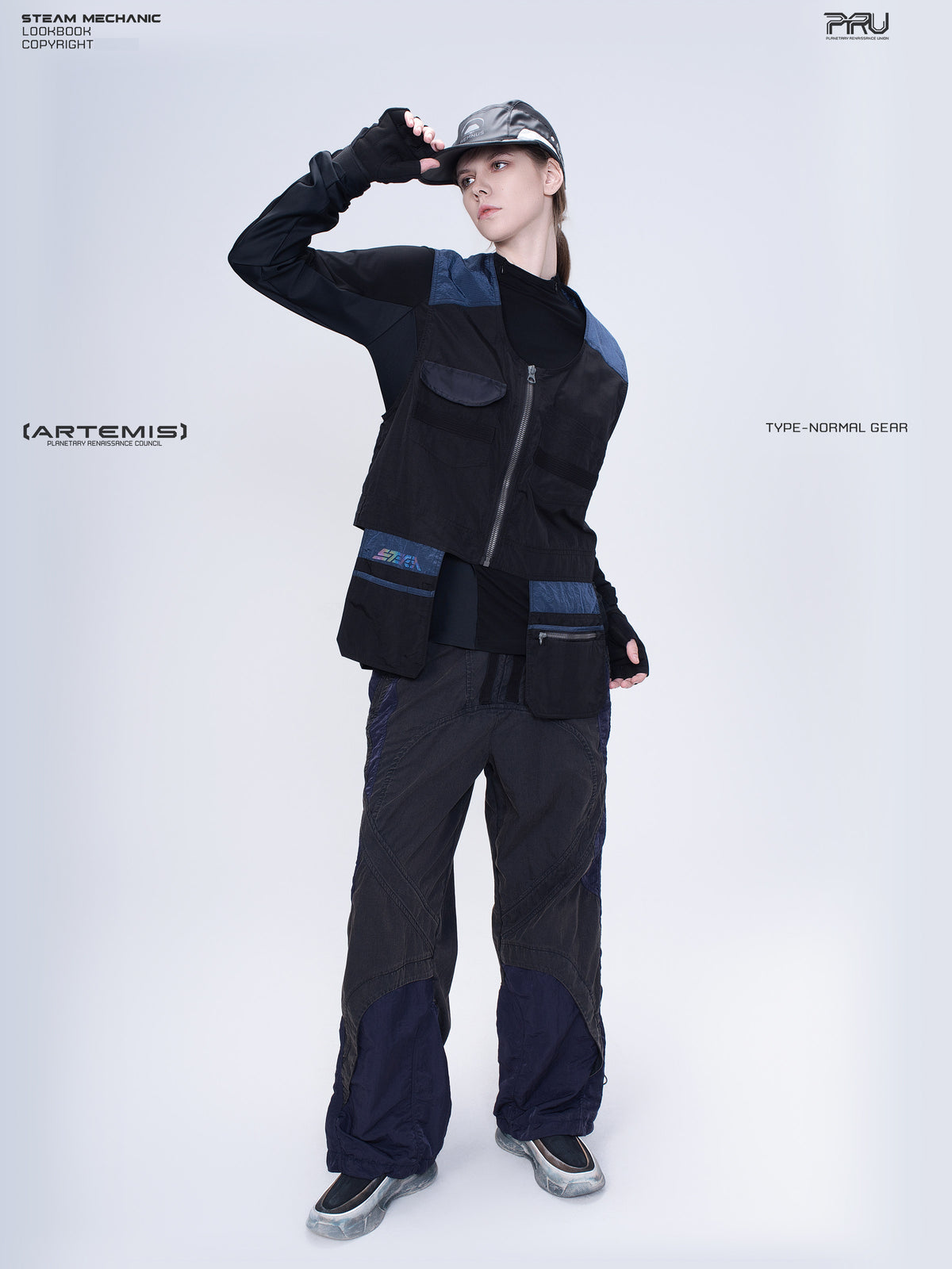 PIONEER stardust black multi-pocket technical vest — full-length modeled front view with raised hand