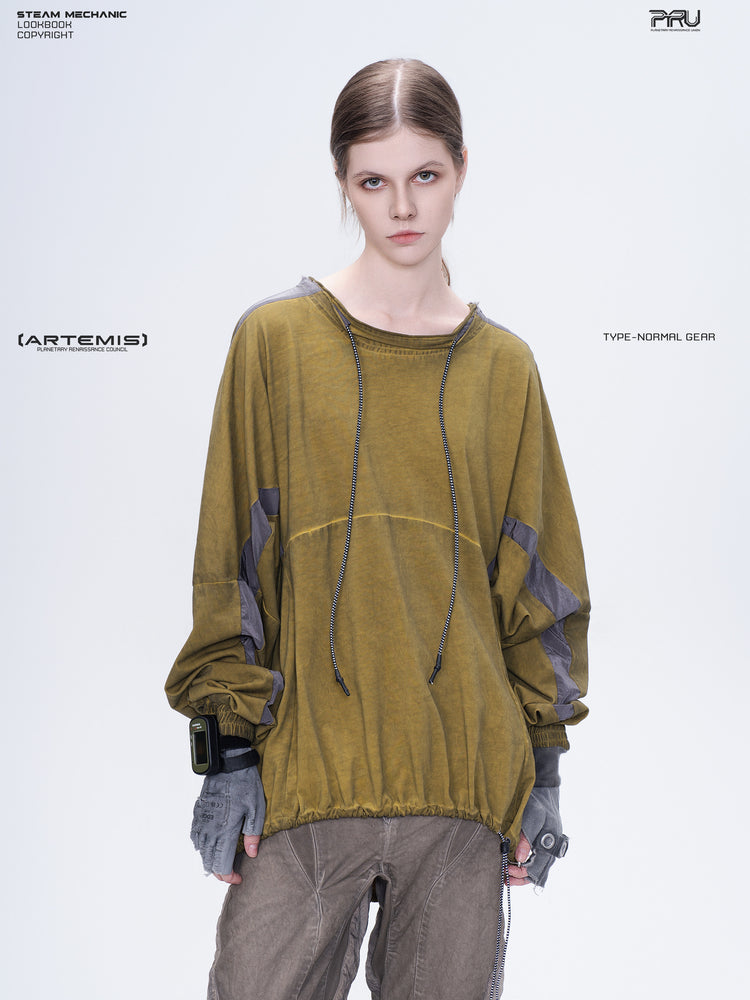 PIONEER mars yellow drawstring commuter sweatshirt — modeled front view showing the drawstrings and shoulder panels