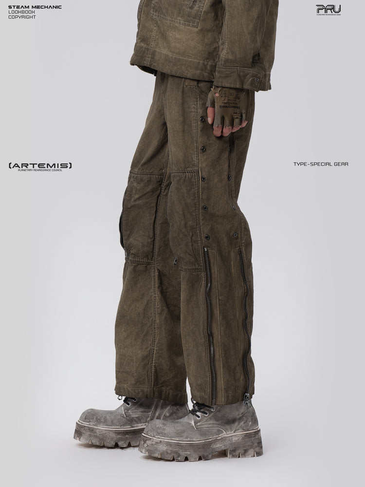 PIONEER knee-mesh utility work pants in lunar soil green — opposite side modeled view showing the lower-leg zipper