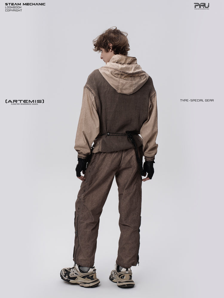 PIONEER knee-mesh utility work pants in ochre brown — rear full-length modeled view showing the relaxed leg shape