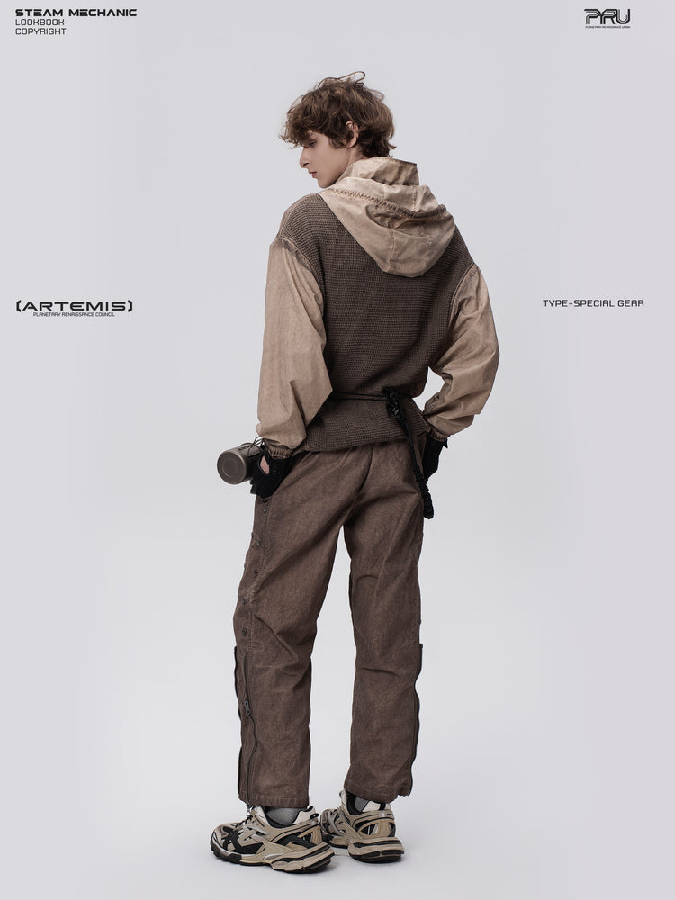 PIONEER knee-mesh utility work pants in ochre brown — three-quarter rear modeled view showing outer-leg hardware