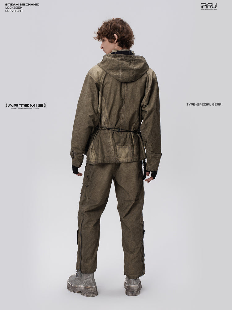 PIONEER knee-mesh utility work pants in lunar soil green — three-quarter rear full-length modeled view showing the side leg fasteners