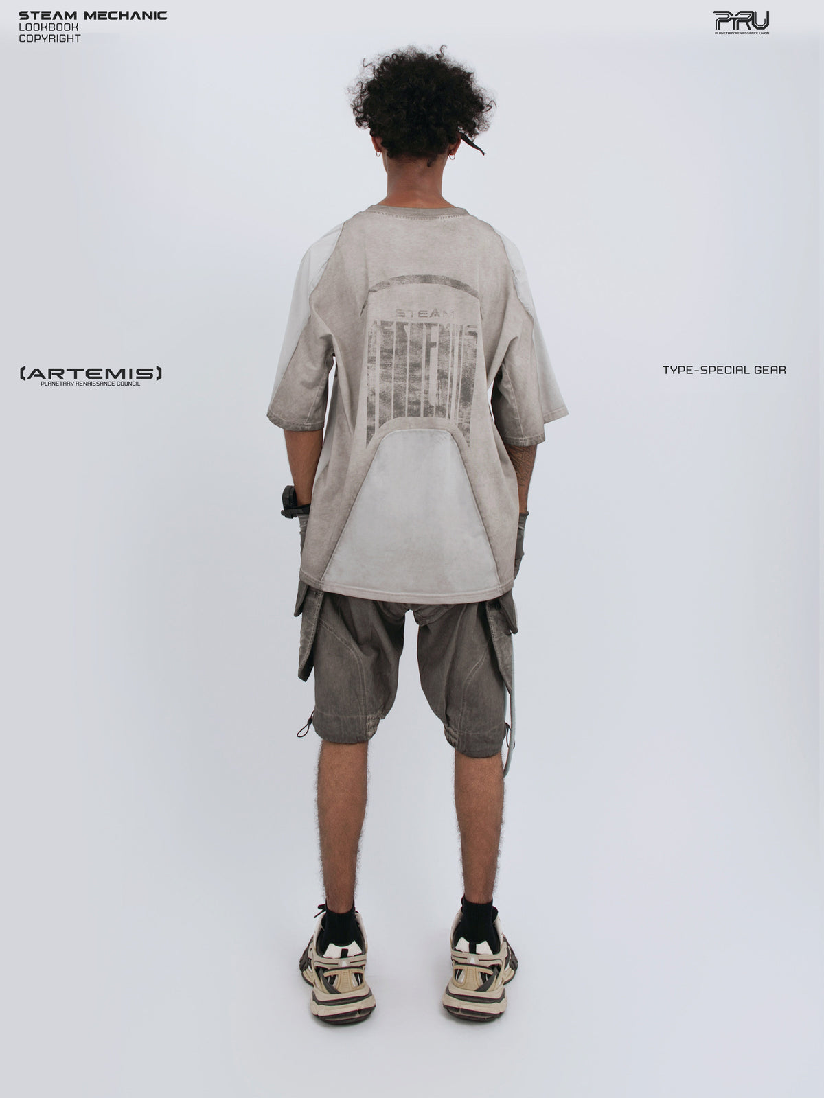 ARTEMIS xirang brown detachable technical shorts — straight back full-outfit view styled with a loose tee