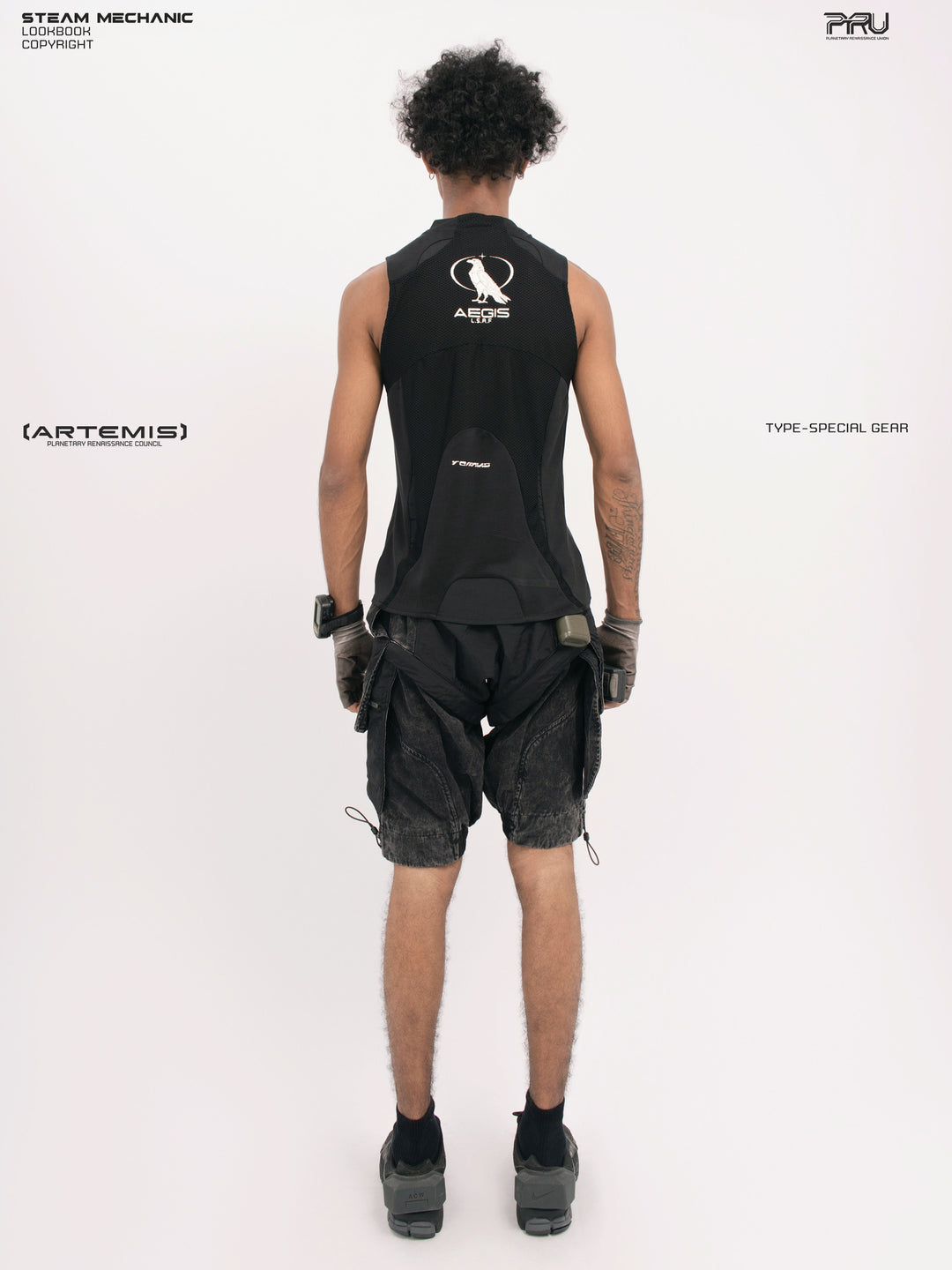 ARTEMIS blackbird black detachable technical shorts — straight back full-outfit view showing the rear shorts panels
