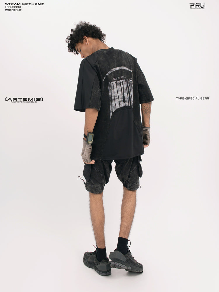 ARTEMIS blackbird black detachable technical shorts — rear three-quarter full-outfit view styled with a loose tee