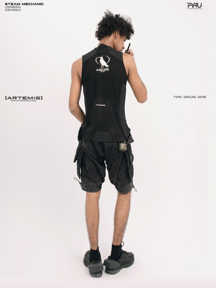ARTEMIS blackbird black detachable technical shorts — opposite rear three-quarter full-outfit view with a radio styling prop