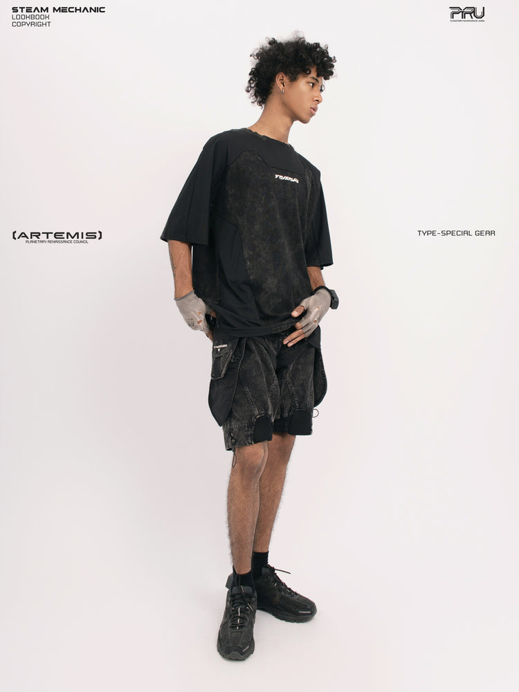 ARTEMIS blackbird black detachable technical shorts — front three-quarter full-outfit view styled with a black tee
