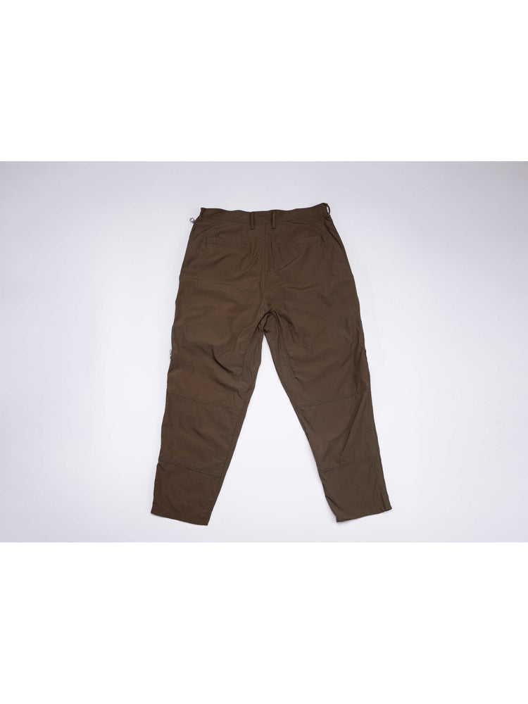 GAIA curved-blade technical pants in stone green — back garment-only view showing seat seams and tapered hems