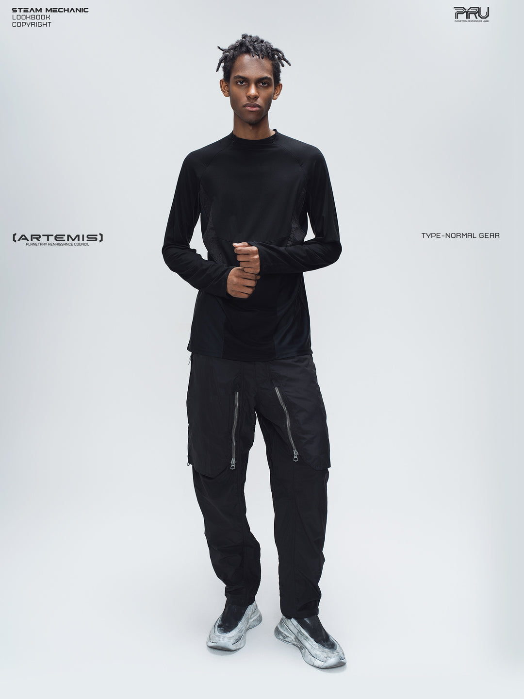 GAIA black curved-blade technical pants — full-length modeled view with a black base layer