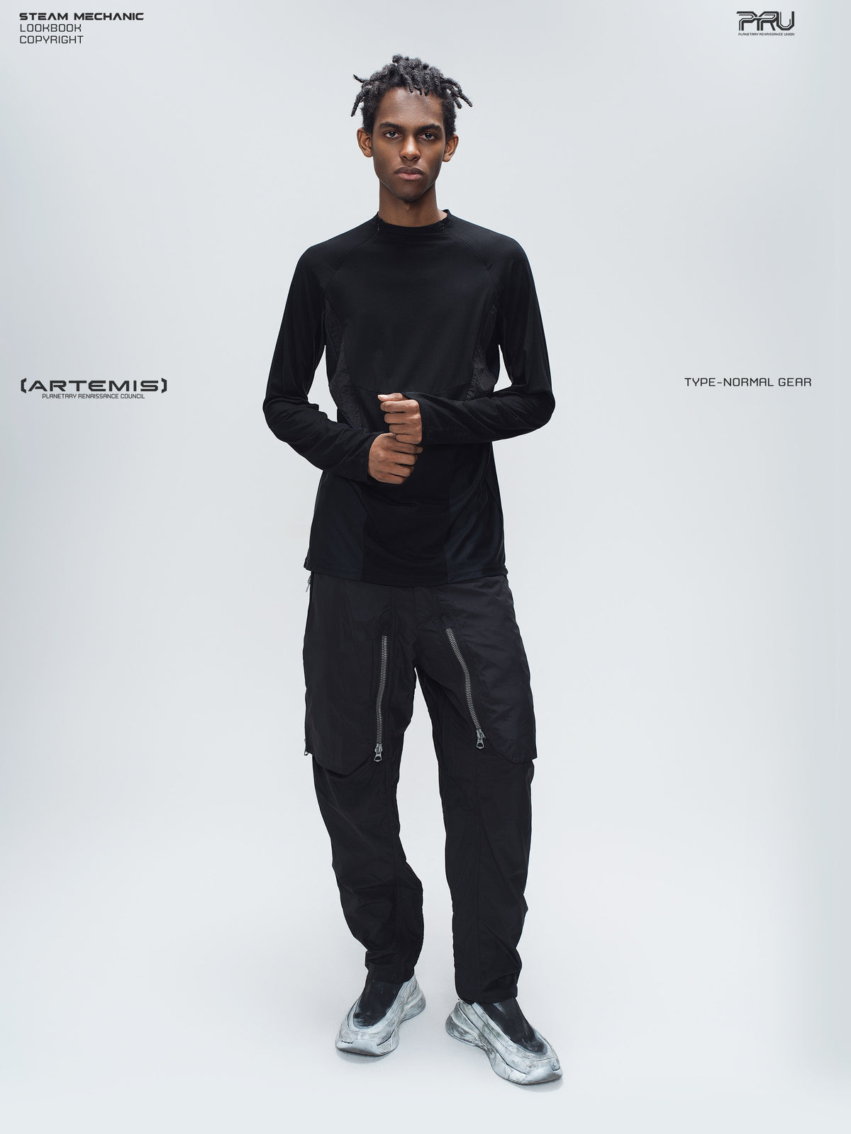 GAIA black curved-blade technical pants — full-length modeled view with a black base layer