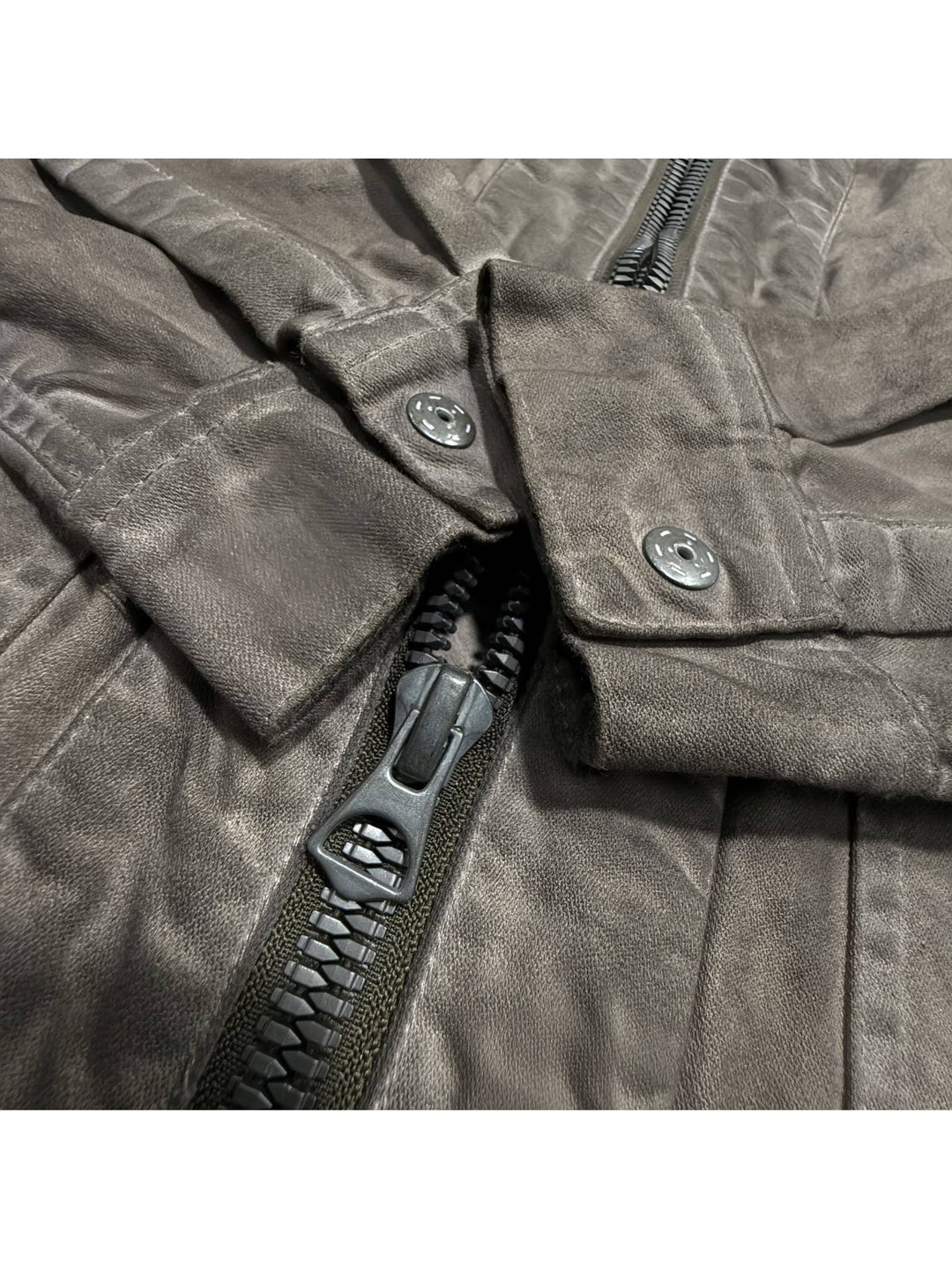 GAIA gravel brown open-collar technical robe — gravel brown cuff fastenings and zipper close-up