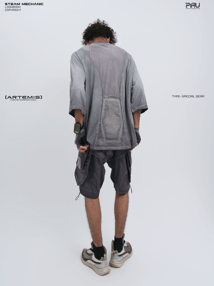 STARCORE stellar blue distressed mesh tee — full-length modeled back view holding the hem