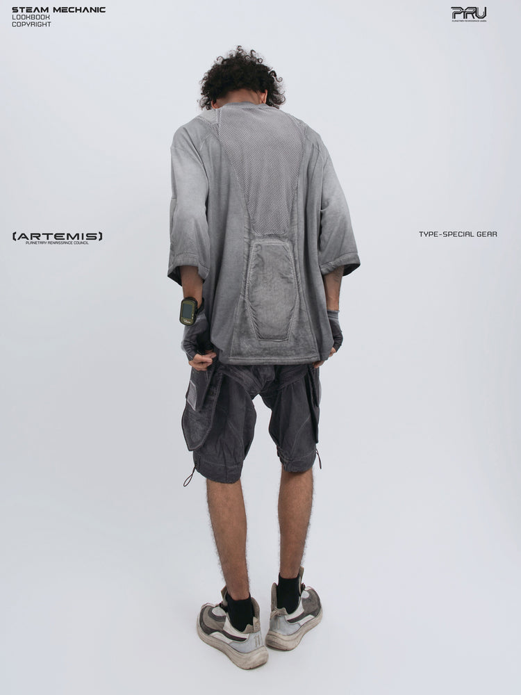 STARCORE moon dust gray distressed mesh tee — full-length modeled back view holding the hem