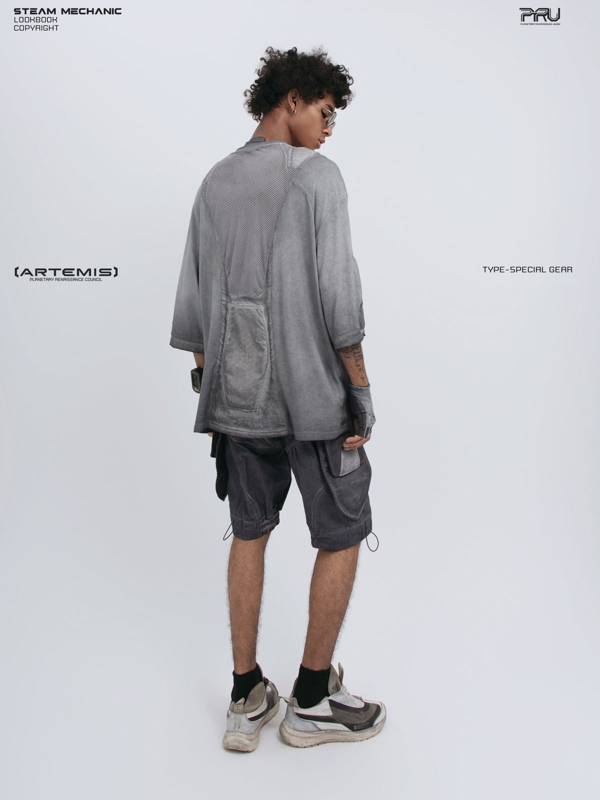 STARCORE moon dust gray distressed mesh tee — full-length modeled rear three-quarter view showing the mesh panel