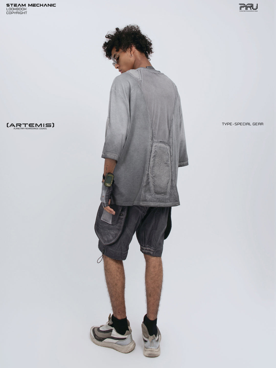 STARCORE moon dust gray distressed mesh tee — full-length modeled rear three-quarter view from the opposite side