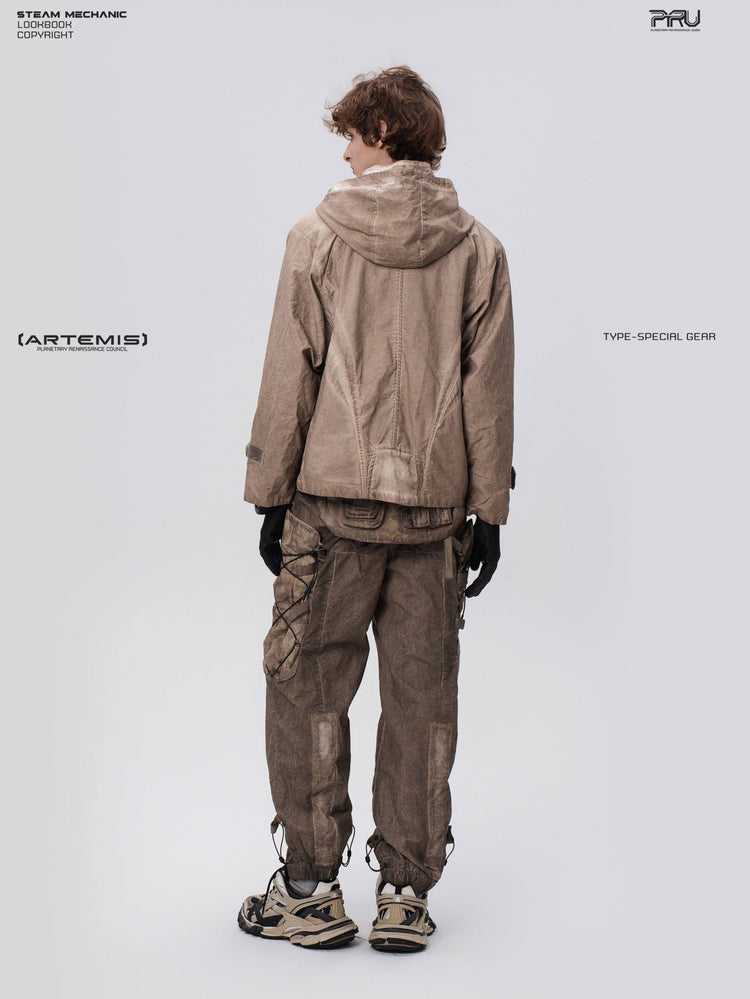 STARCORE distressed work jacket in gravel brown — full-length rear modeled view looking over the left shoulder