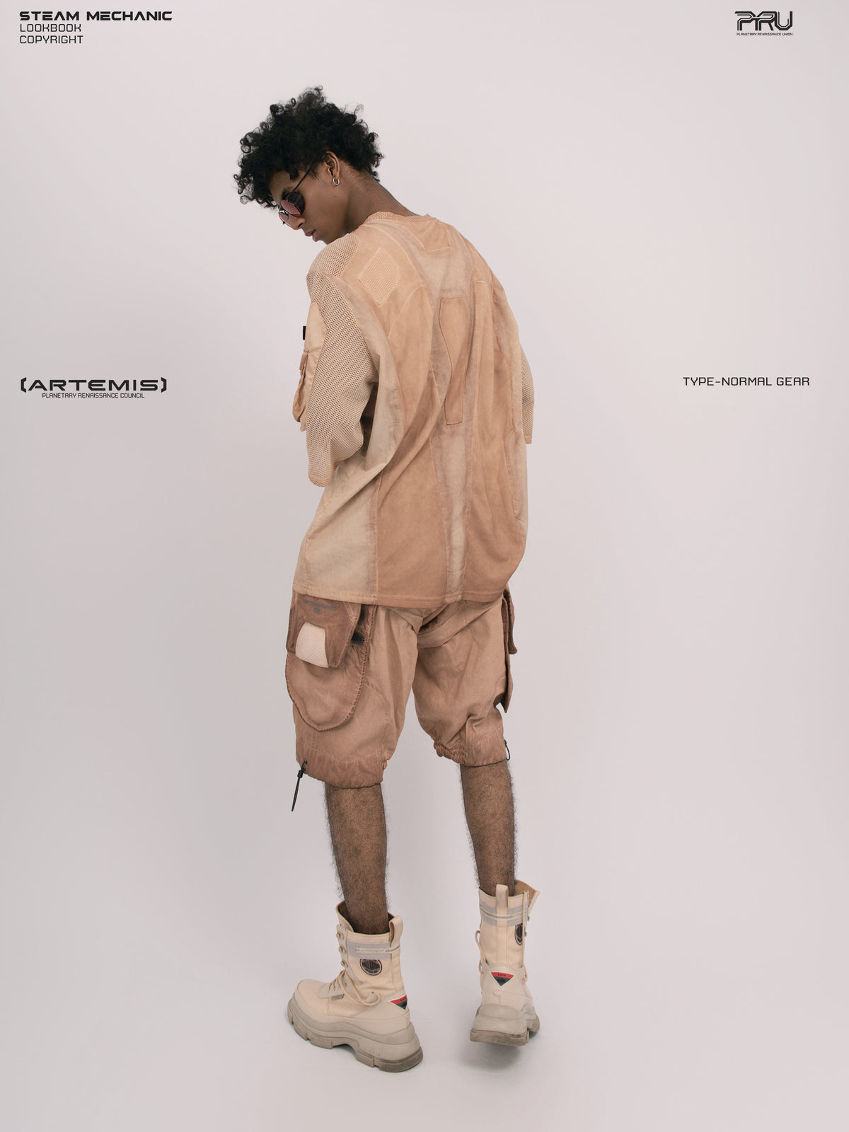 STARCORE soft dawn orange velcro mesh tee — full-length modeled rear three-quarter view showing the mesh sleeve