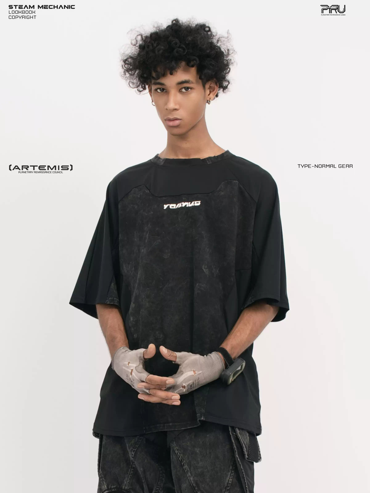 STARCORE black tortoise velcro mesh tee — front close-up with hands clasped