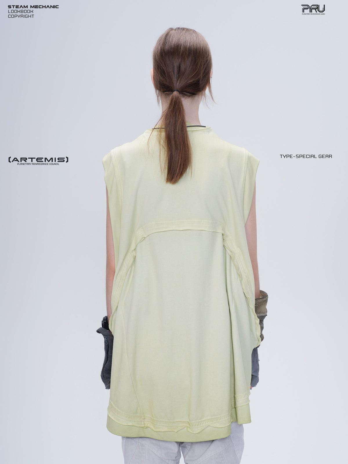 SUPERNOVA convertible drawstring technical tee — nebula green modeled back view showing the layered convertible panel