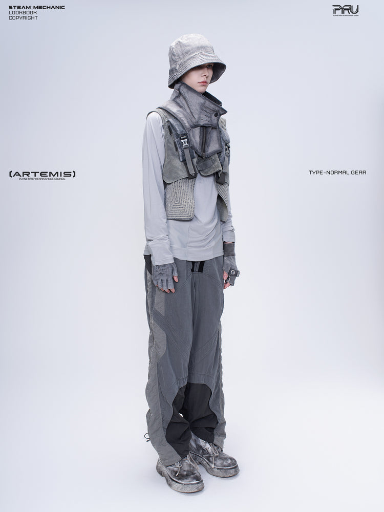 SUPERNOVA alloy gray metallic nylon technical pants — full-length modeled three-quarter front view showing the tapered layers
