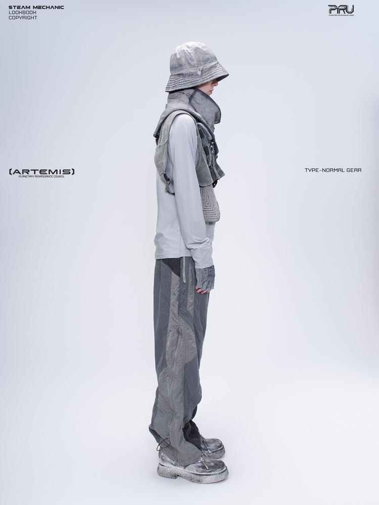 SUPERNOVA alloy gray metallic nylon technical pants — full-length modeled side view showing the technical leg panels