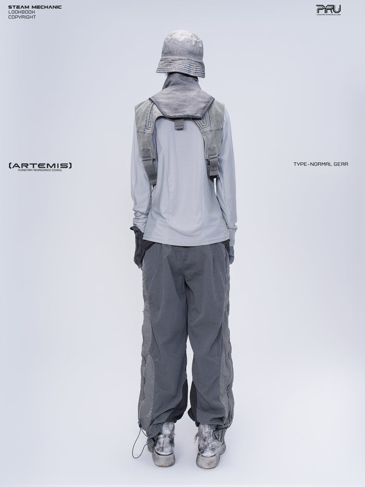 SUPERNOVA alloy gray metallic nylon technical pants — full-length modeled back view showing the contrasting lower-leg panels