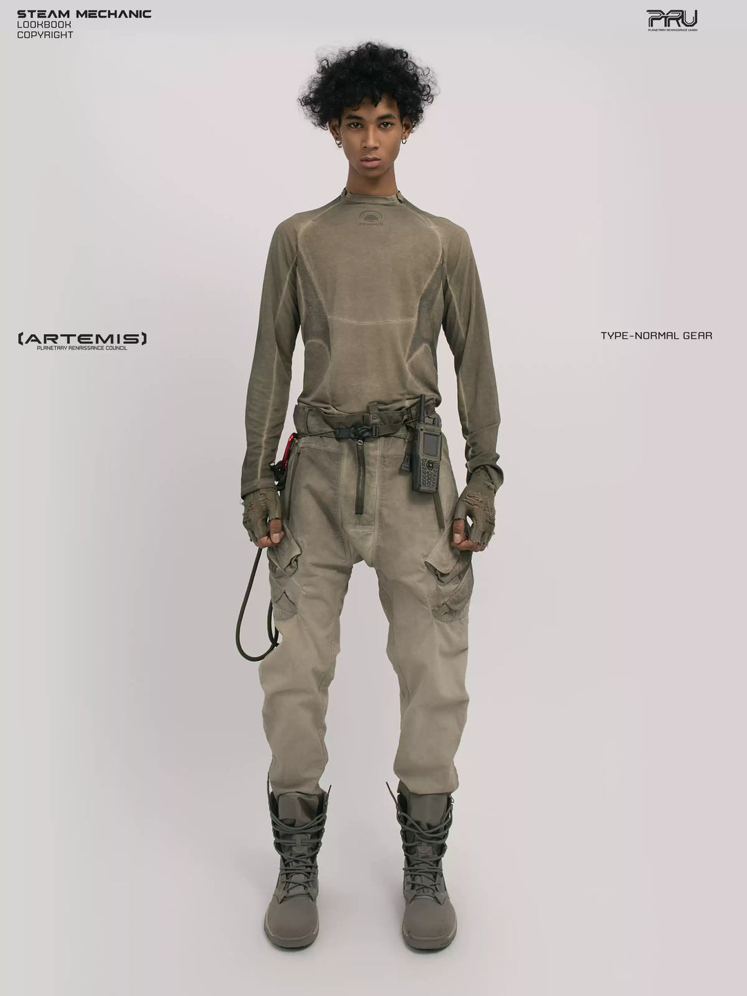 AEGIS lunar soil teal multi-pocket moto pants — full-length front modeled view with a coordinating olive top