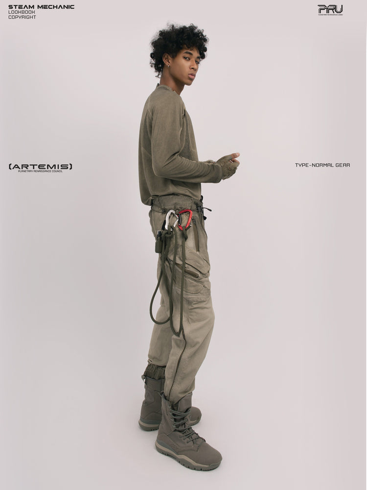 AEGIS lunar soil teal multi-pocket moto pants — full-length right-side modeled view showing the pocket profile
