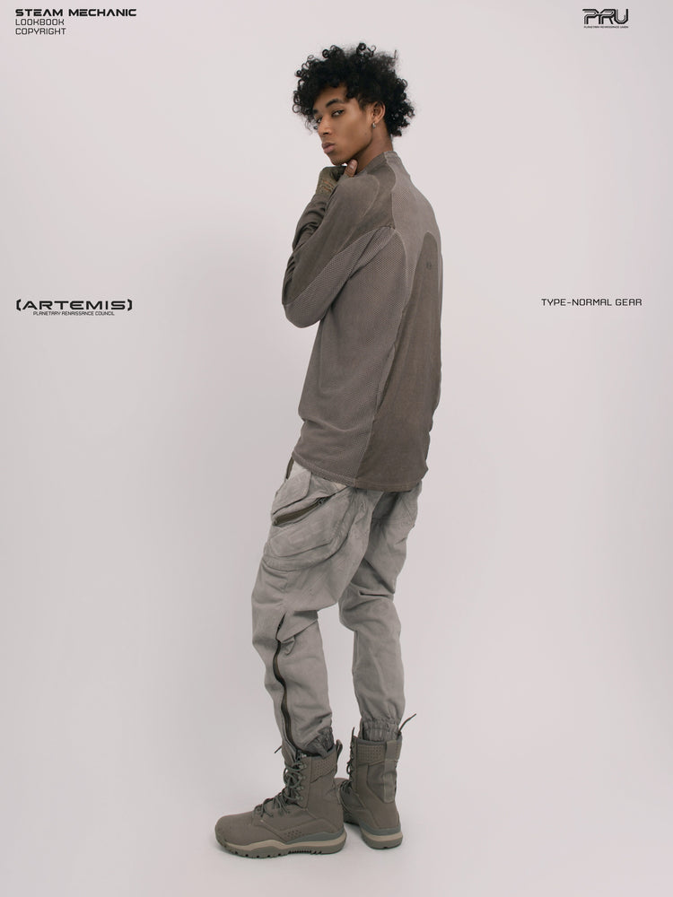 AEGIS lunar sea gray multi-pocket moto pants — full-length rear-side modeled view showing the outer-leg zippers and angled pockets