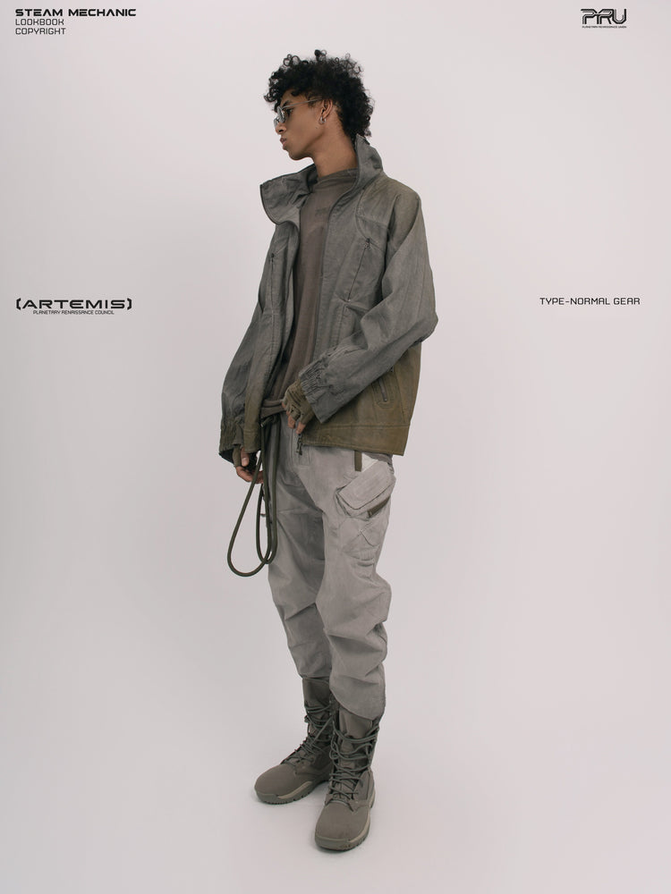 AEGIS lunar sea gray multi-pocket moto pants — full-length side modeled view with a coordinating jacket
