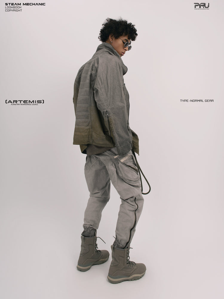 AEGIS lunar sea gray multi-pocket moto pants — full-length rear three-quarter modeled view with a coordinating jacket