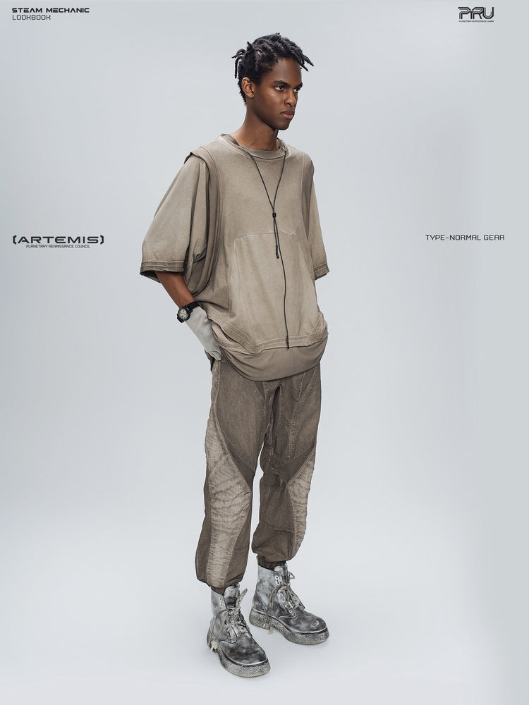 AEGIS cropped moto riding pants in mercury brown — full-length three-quarter modeled view