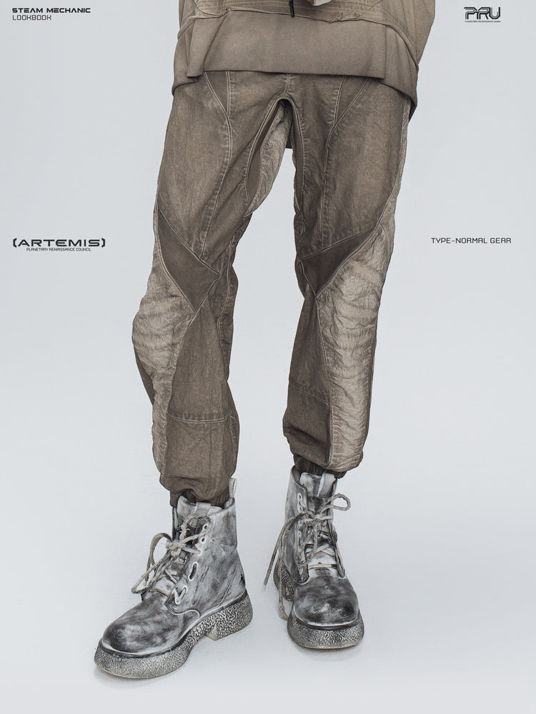 AEGIS cropped moto riding pants in mercury brown — front modeled detail of the washed fabric and knee panels