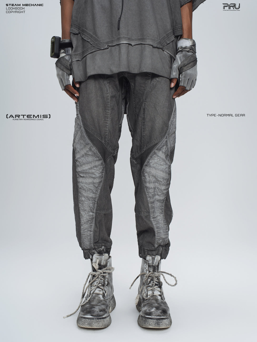 AEGIS moon dust gray cropped moto riding pants — front modeled view showing angled knee panels and gathered cuffs