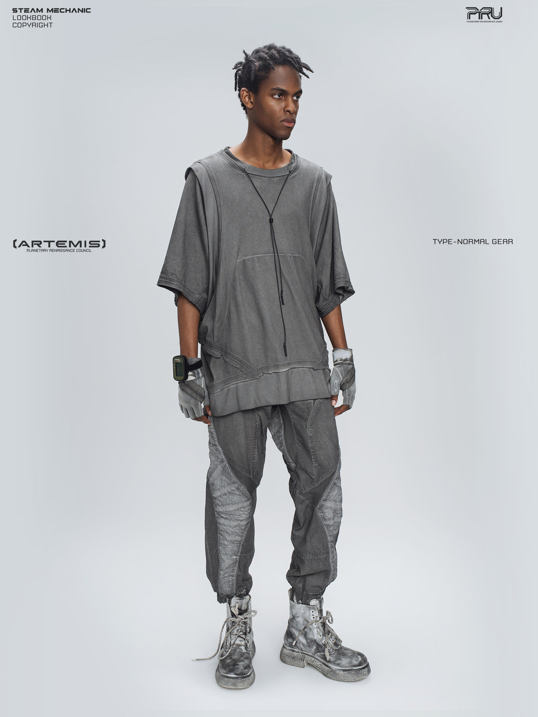 AEGIS moon dust gray cropped moto riding pants — full-body angled modeled view with arms lowered