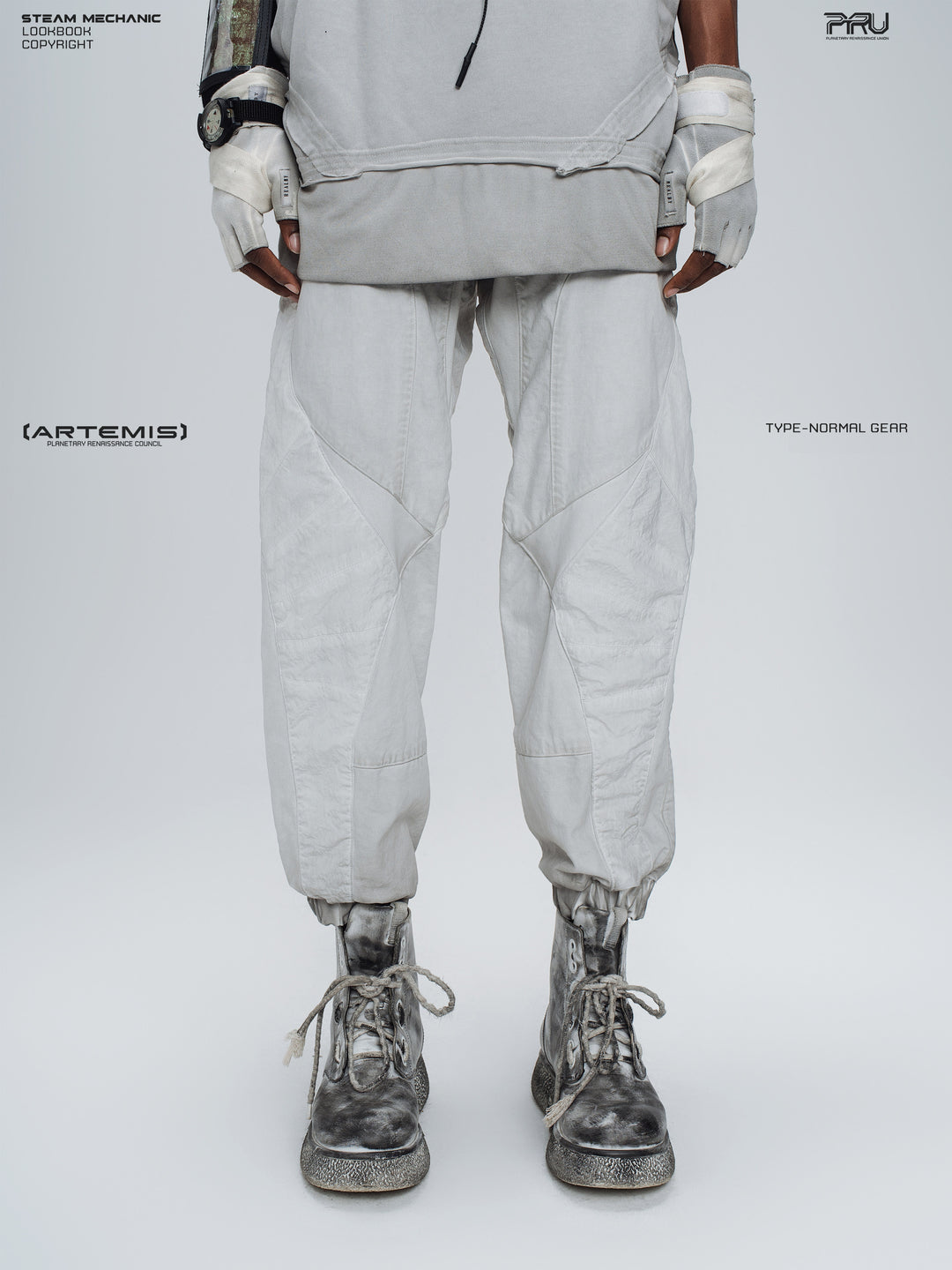AEGIS eris white cropped moto riding pants — front modeled view showing angular white panels and cropped cuffs