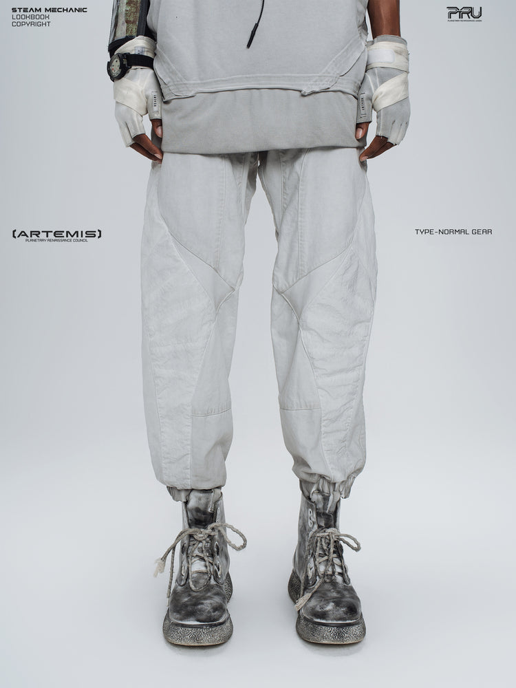 AEGIS eris white cropped moto riding pants — front modeled view showing angular white panels and cropped cuffs
